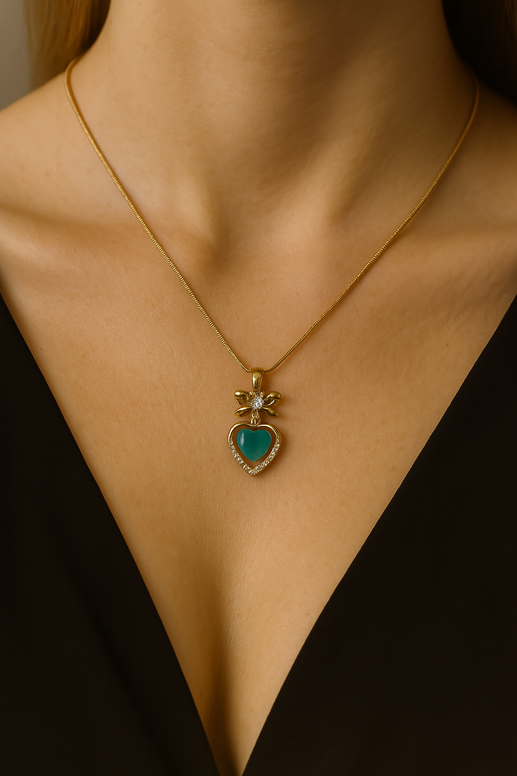 Gold Heart Pendant Necklace with Turquoise Center & Crystal Bow – Elegant Statement Jewelry