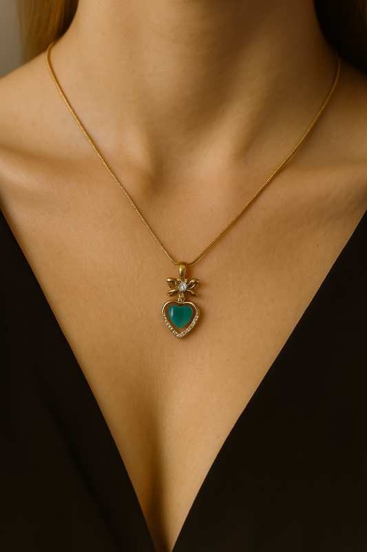Gold Heart Pendant Necklace with Turquoise Center & Crystal Bow – Elegant Statement Jewelry